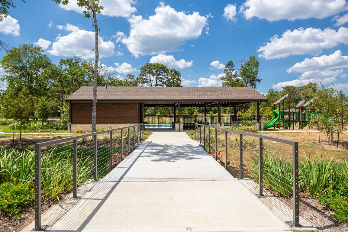 2312 Pipefish Drive Conroe, TX 77384 - Photo 7 of 33 a view of a house with a porch