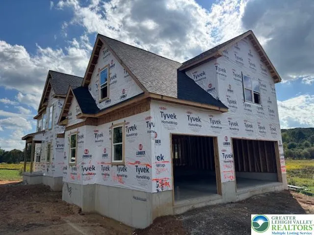 a building with glass windows and a fireplace