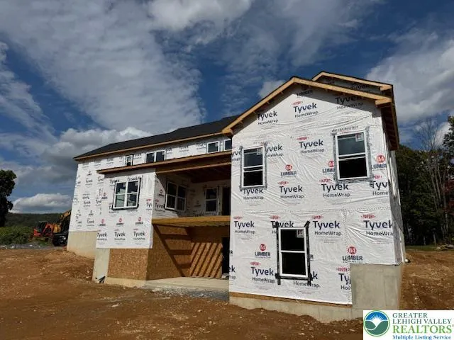 a view of a front of house with garage