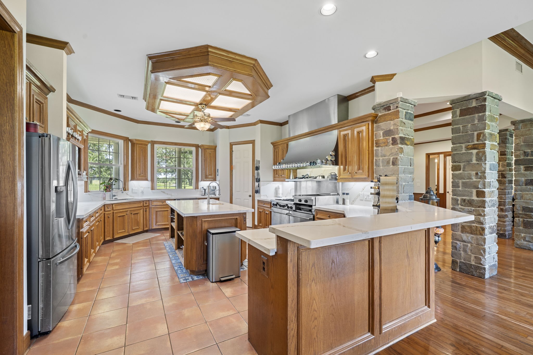 35111 Tompkins Road Hempstead, TX 77445 - Photo 12 of 50 a kitchen that has a lot of cabinets in it