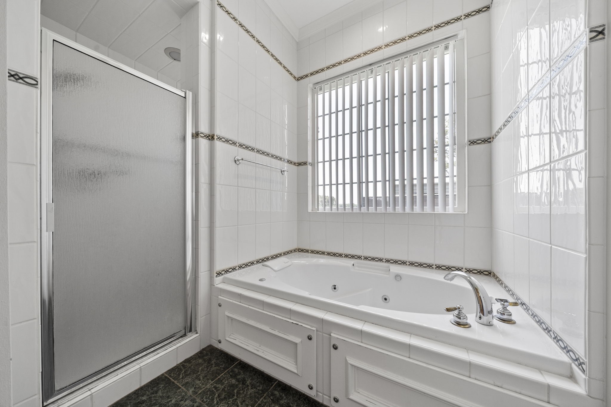 35111 Tompkins Road Hempstead, TX 77445 - Photo 20 of 50 a bathroom with a bathtub and shower