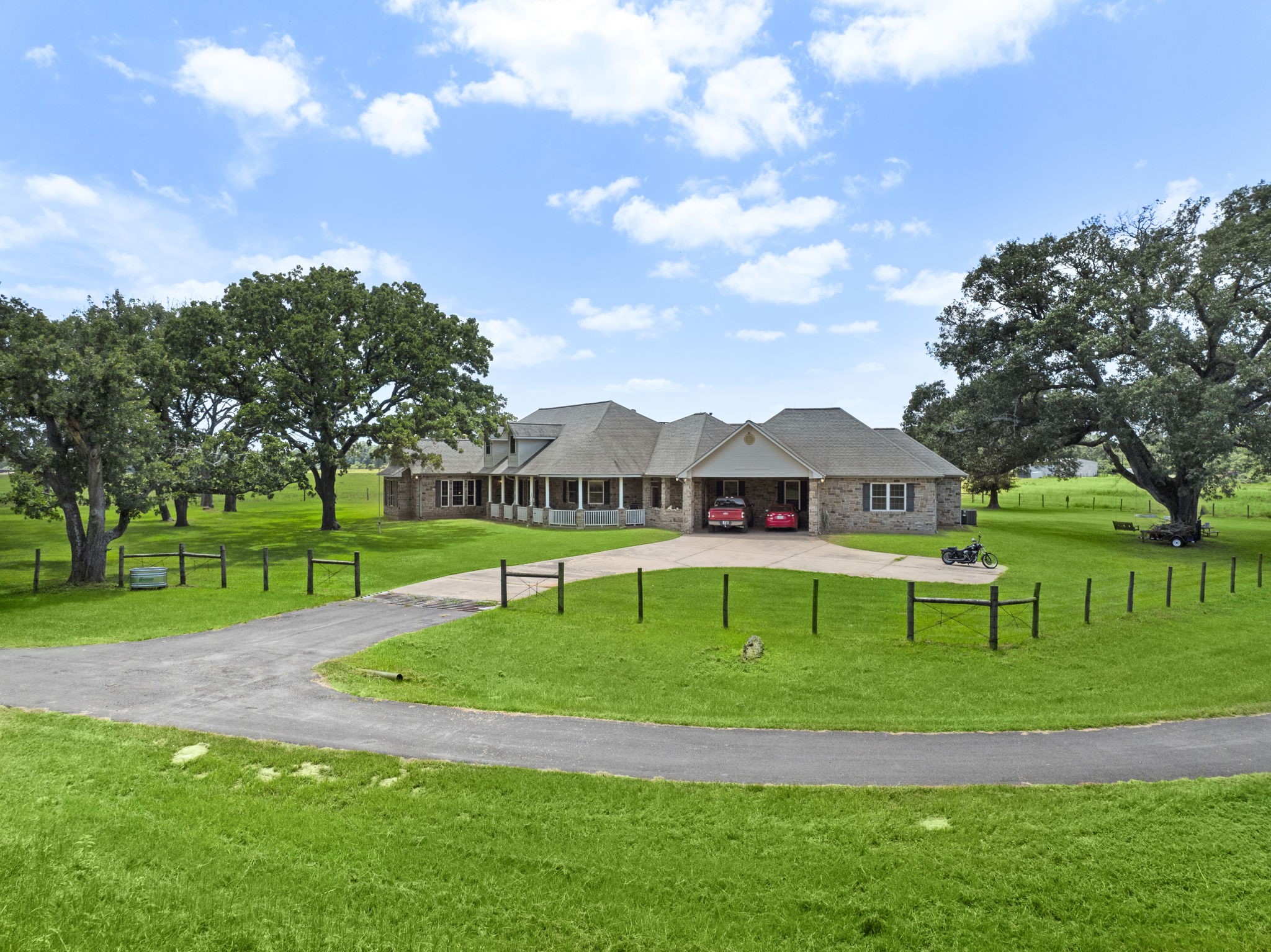 35111 Tompkins Road Hempstead, TX 77445 - Photo 2 of 50 a view of a house with a big yard
