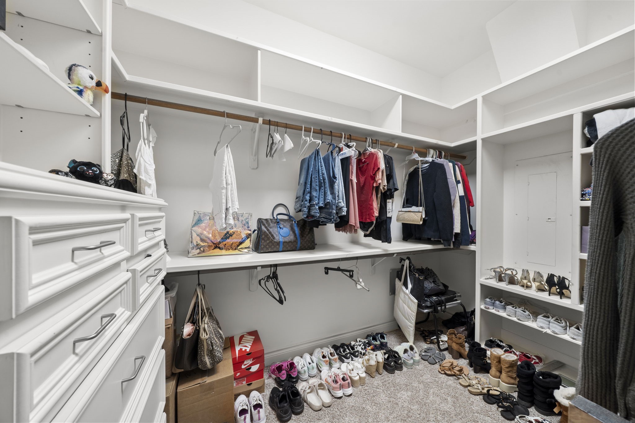 35111 Tompkins Road Hempstead, TX 77445 - Photo 21 of 50 a view of walk in closet with clothes and shoes