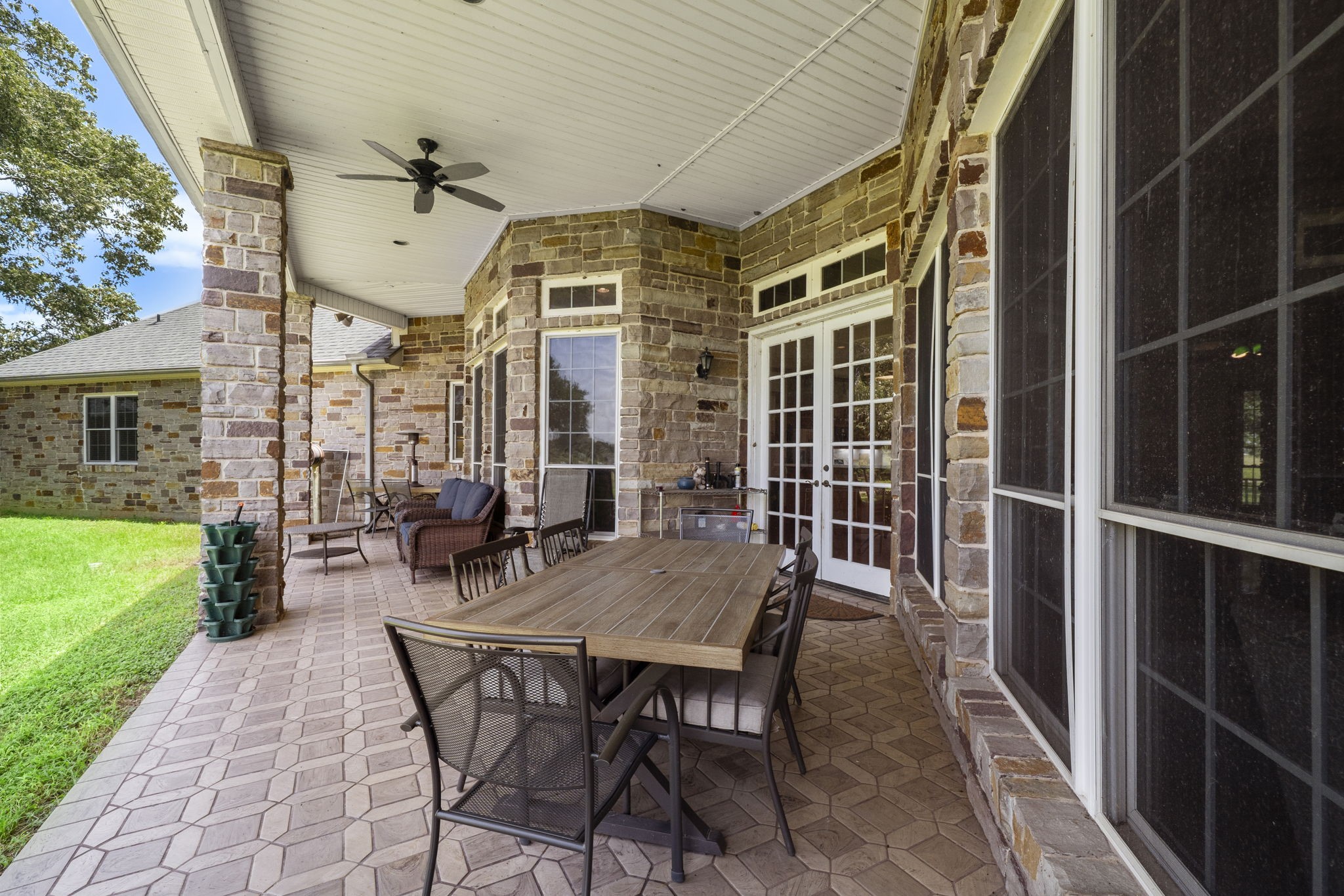 35111 Tompkins Road Hempstead, TX 77445 - Photo 34 of 50 a view of a patio with a table and chairs