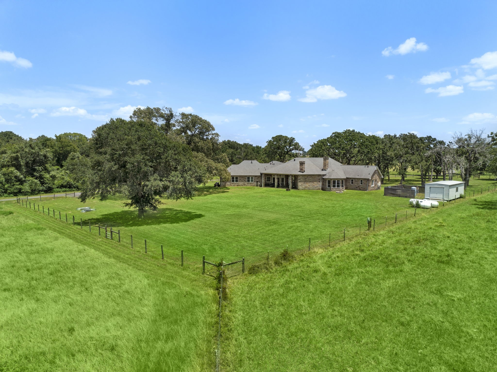 35111 Tompkins Road Hempstead, TX 77445 - Photo 45 of 50 a view of a big yard with potted plants and large tree