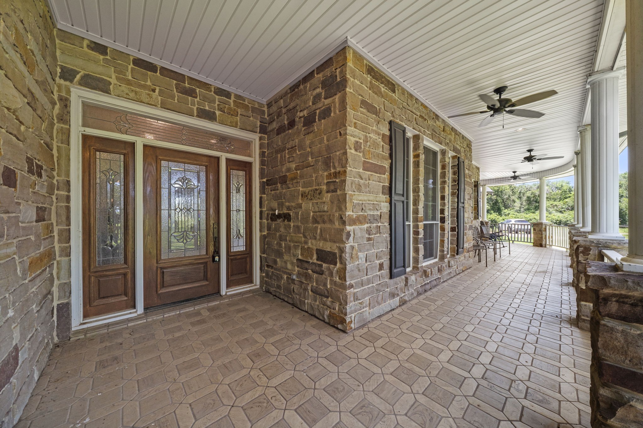 35111 Tompkins Road Hempstead, TX 77445 - Photo 7 of 50 a view of a porch with furniture and floor to ceiling window