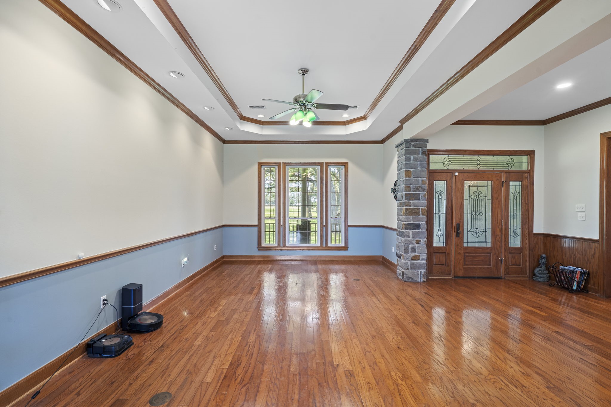 35111 Tompkins Road Hempstead, TX 77445 - Photo 10 of 50 a view of empty room with wooden floor and fan