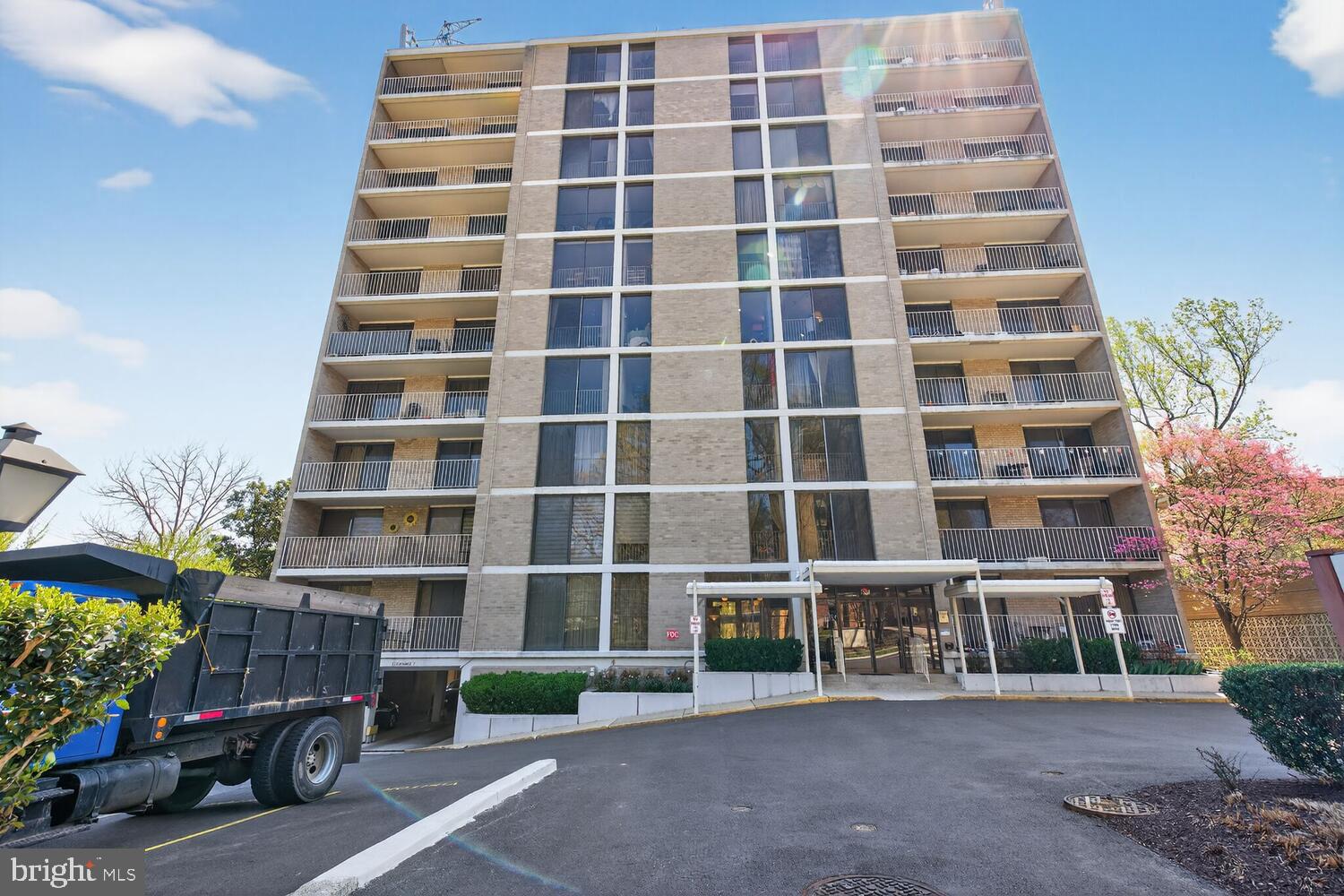 2100 Washington Avenue, Unit 6A Silver Spring, MD 20910 - Photo 15 of 16 a view of a tall building with a yard
