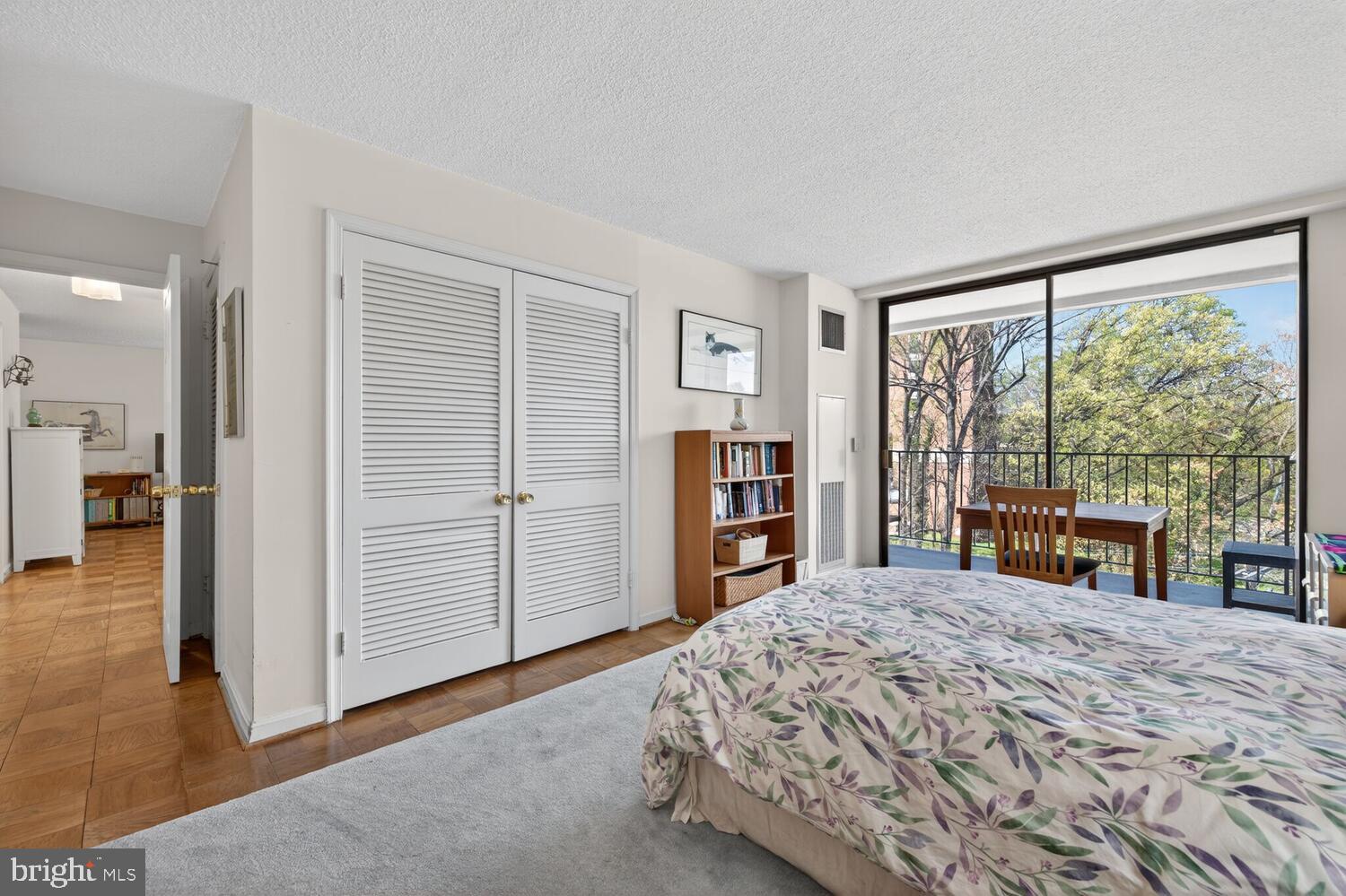 2100 Washington Avenue, Unit 6A Silver Spring, MD 20910 - Photo 7 of 16 a bedroom with a bed and a large window