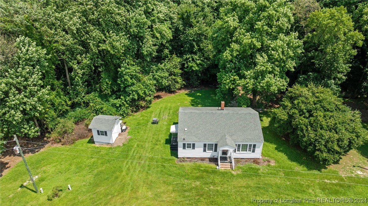 430 Simmons Road Clinton, NC 28328 - Photo 28 of 30 an aerial view of a house with swimming pool garden and patio
