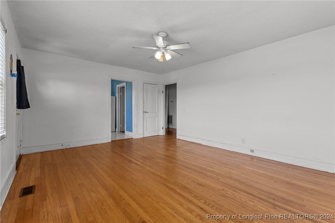430 Simmons Road Clinton, NC 28328 - Photo 5 of 30 wooden floor in an empty room