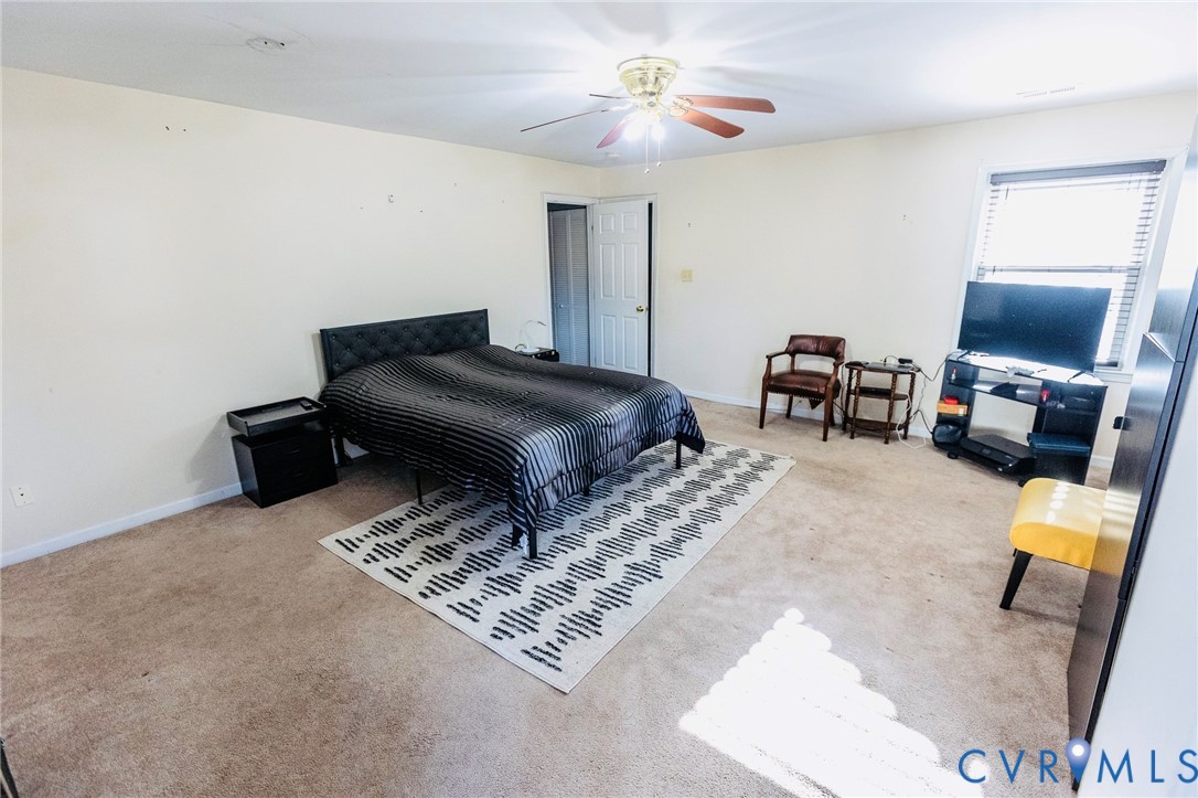 3213 Drawbridge Court Chesapeake, VA 23323 - Photo 5 of 20 a living room with furniture and a flat screen tv