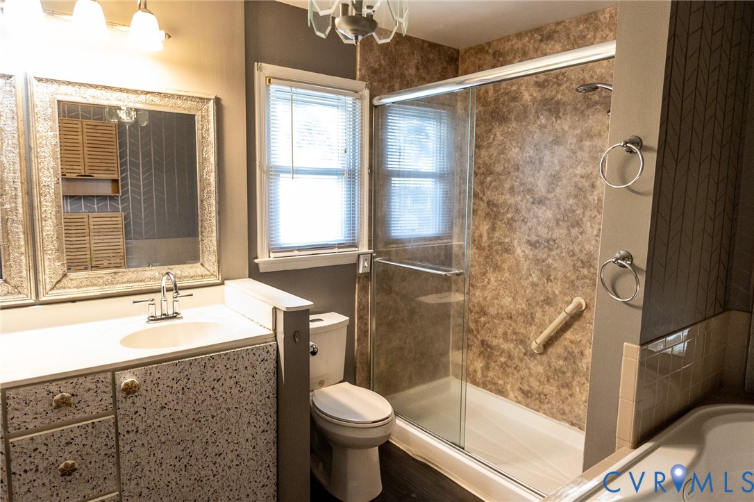 3213 Drawbridge Court Chesapeake, VA 23323 - Photo 7 of 20 a bathroom with a sink toilet and shower