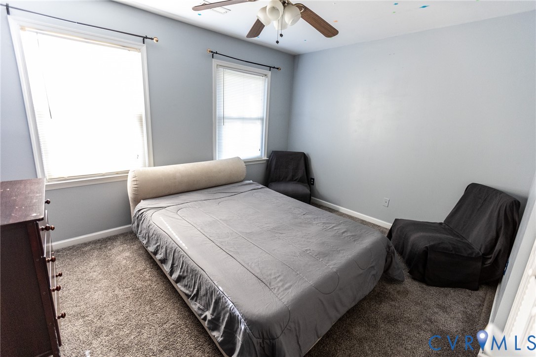 3213 Drawbridge Court Chesapeake, VA 23323 - Photo 8 of 20 a bedroom with a bed and a window