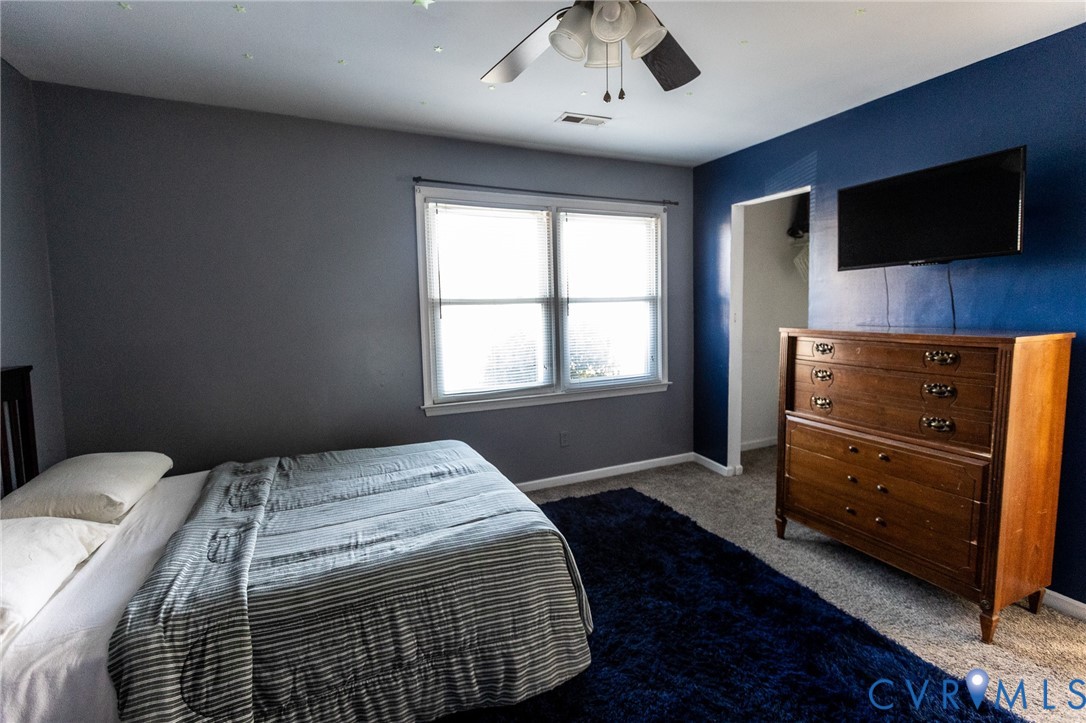 3213 Drawbridge Court Chesapeake, VA 23323 - Photo 10 of 20 a bedroom with a bed and a flat screen tv