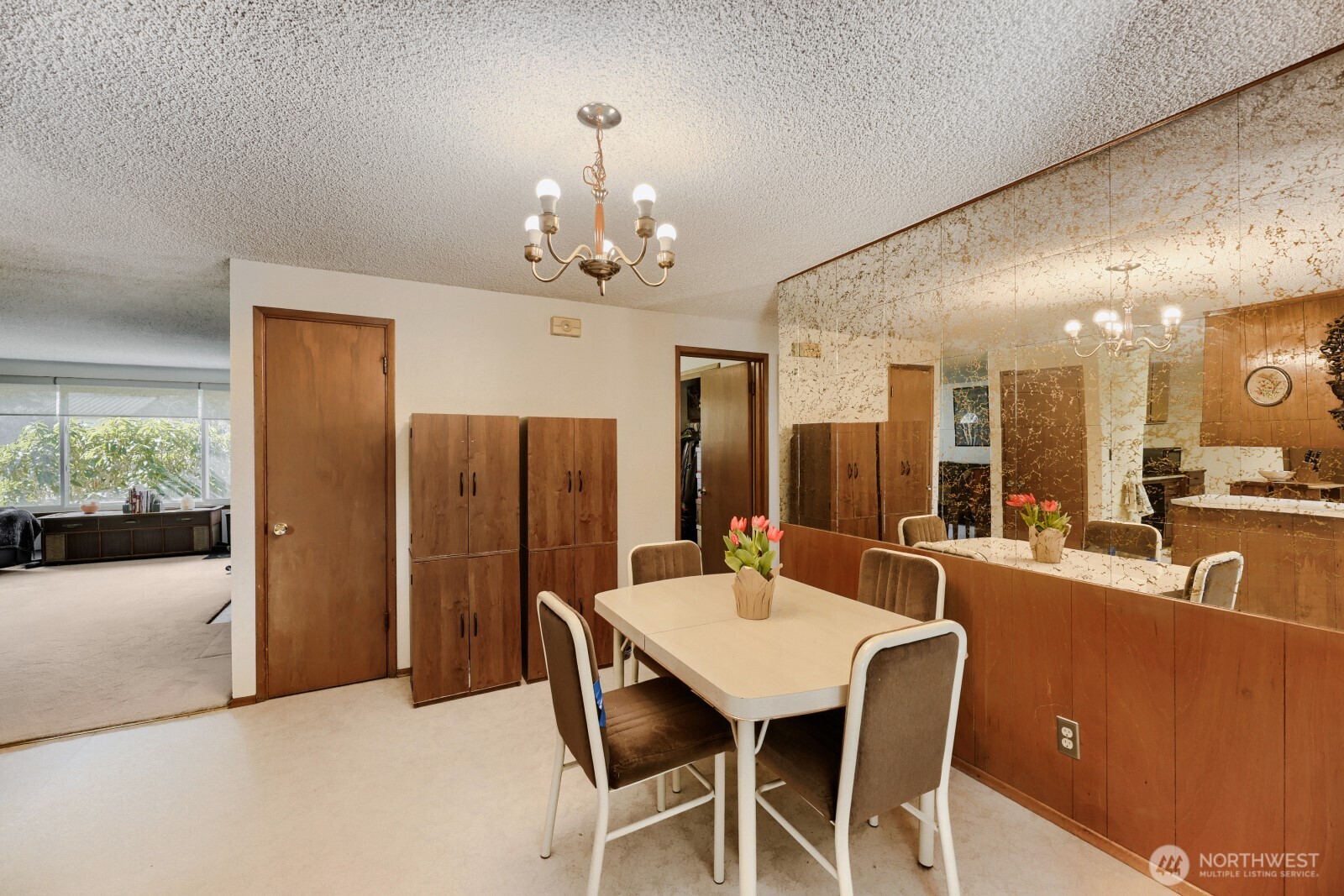 24119 78th Place West Edmonds, WA 98026 - Photo 12 of 29 a view of a dining room with furniture and chandelier