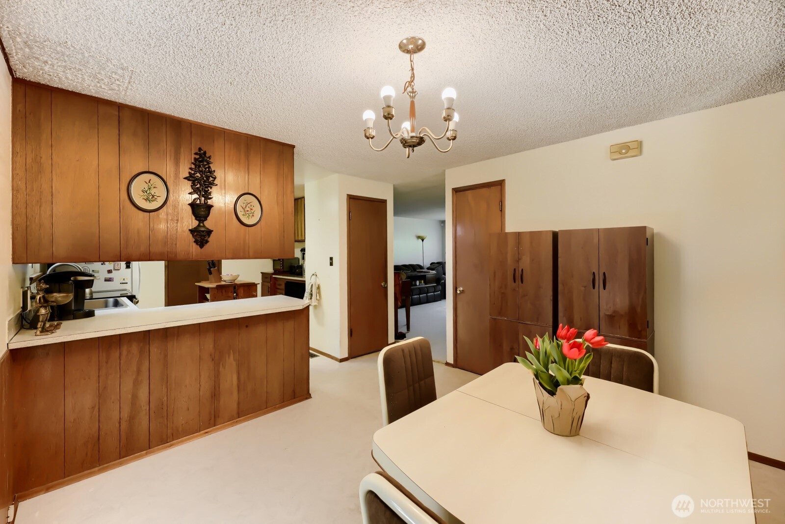 24119 78th Place West Edmonds, WA 98026 - Photo 13 of 29 a view of a dining room with furniture and wooden floor