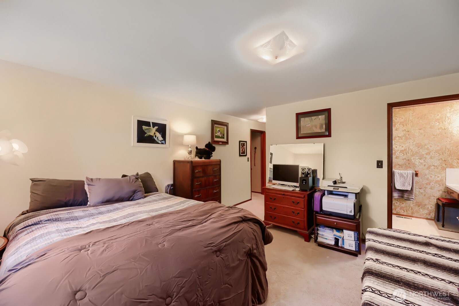 24119 78th Place West Edmonds, WA 98026 - Photo 17 of 29 a bedroom with a bed and furniture