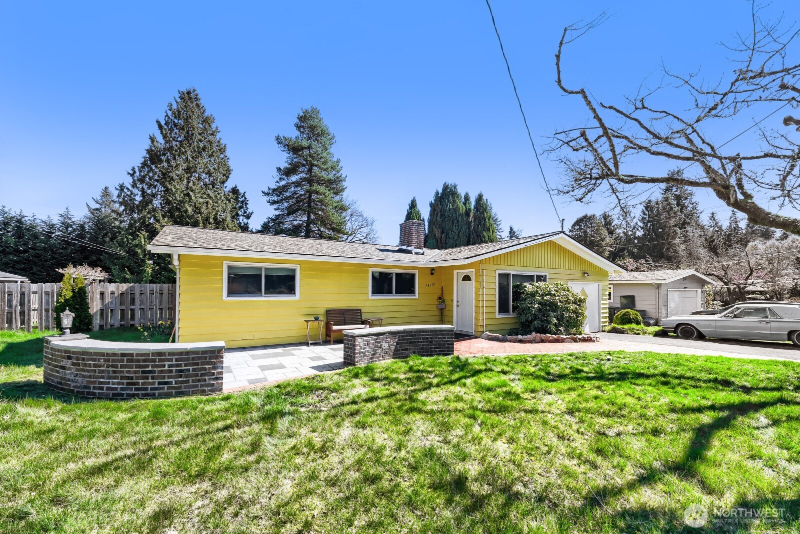 24119 78th Place West Edmonds, WA 98026 - Photo 2 of 29 a front view of house with yard and trees