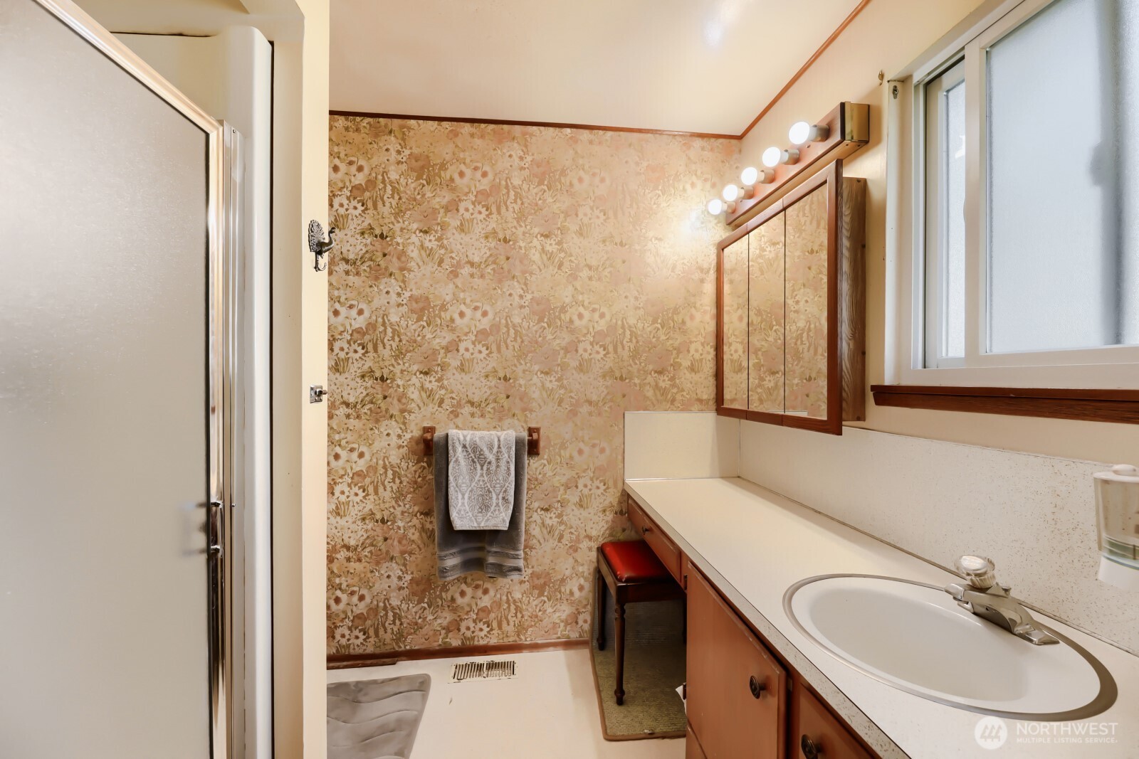 24119 78th Place West Edmonds, WA 98026 - Photo 23 of 29 a bathroom with a sink and a mirror
