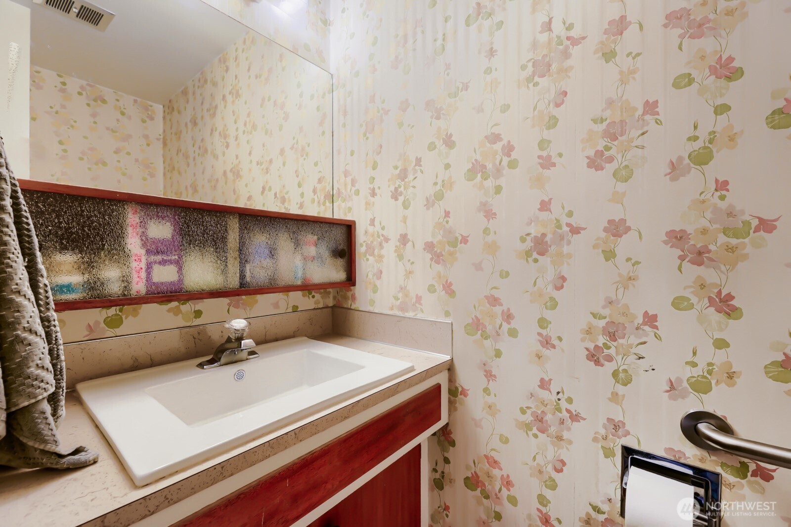 24119 78th Place West Edmonds, WA 98026 - Photo 24 of 29 a bathroom with a sink and a mirror