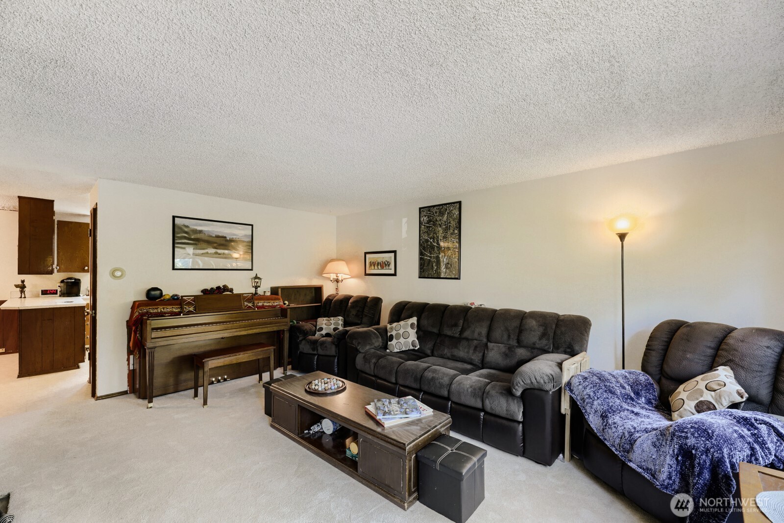 24119 78th Place West Edmonds, WA 98026 - Photo 5 of 29 a living room with furniture a piano and a flat screen tv