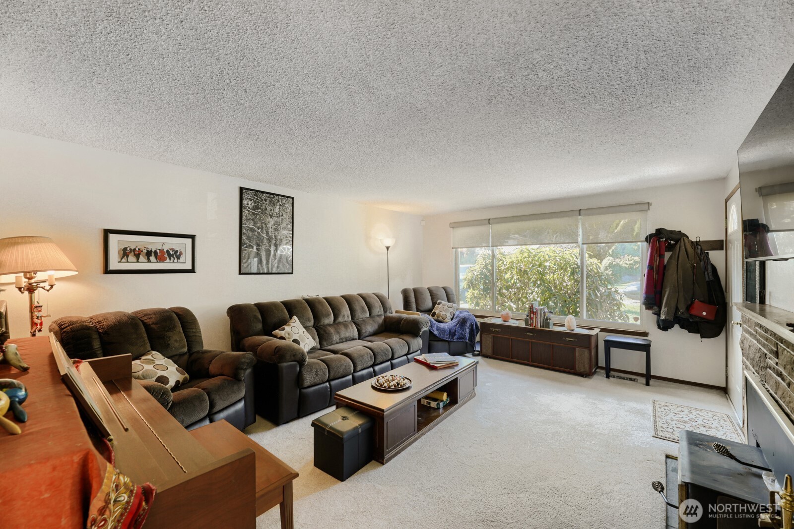 24119 78th Place West Edmonds, WA 98026 - Photo 6 of 29 a living room with furniture and a large window