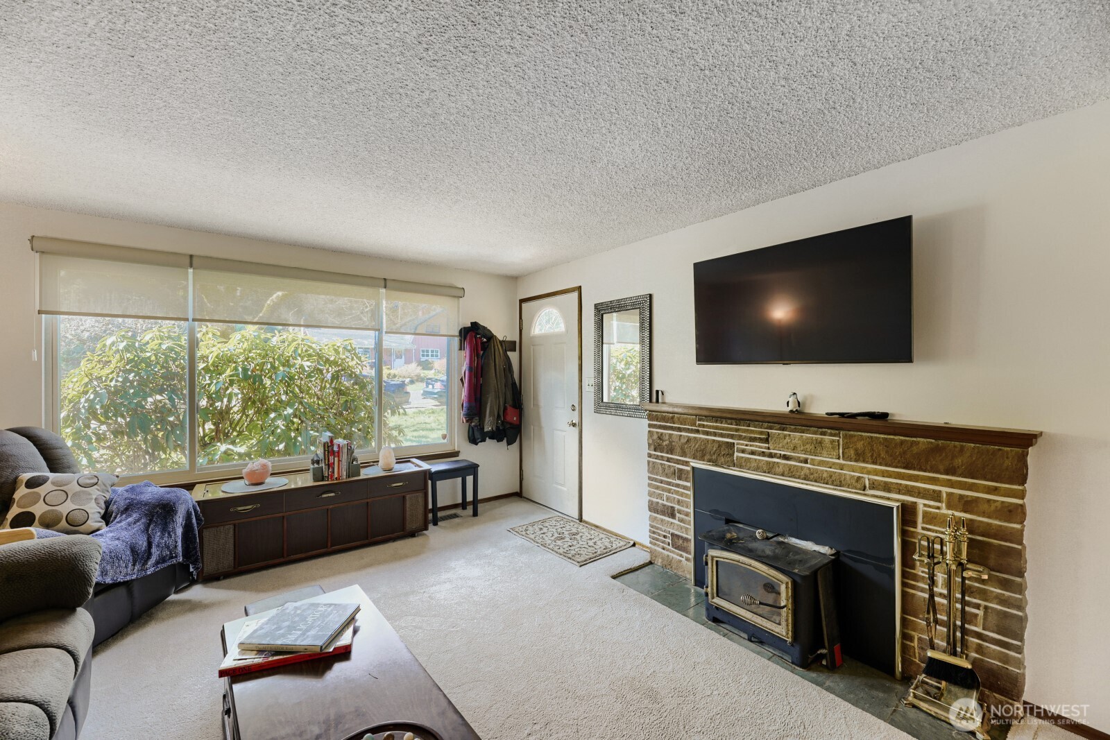 24119 78th Place West Edmonds, WA 98026 - Photo 7 of 29 a living room with furniture and a flat screen tv