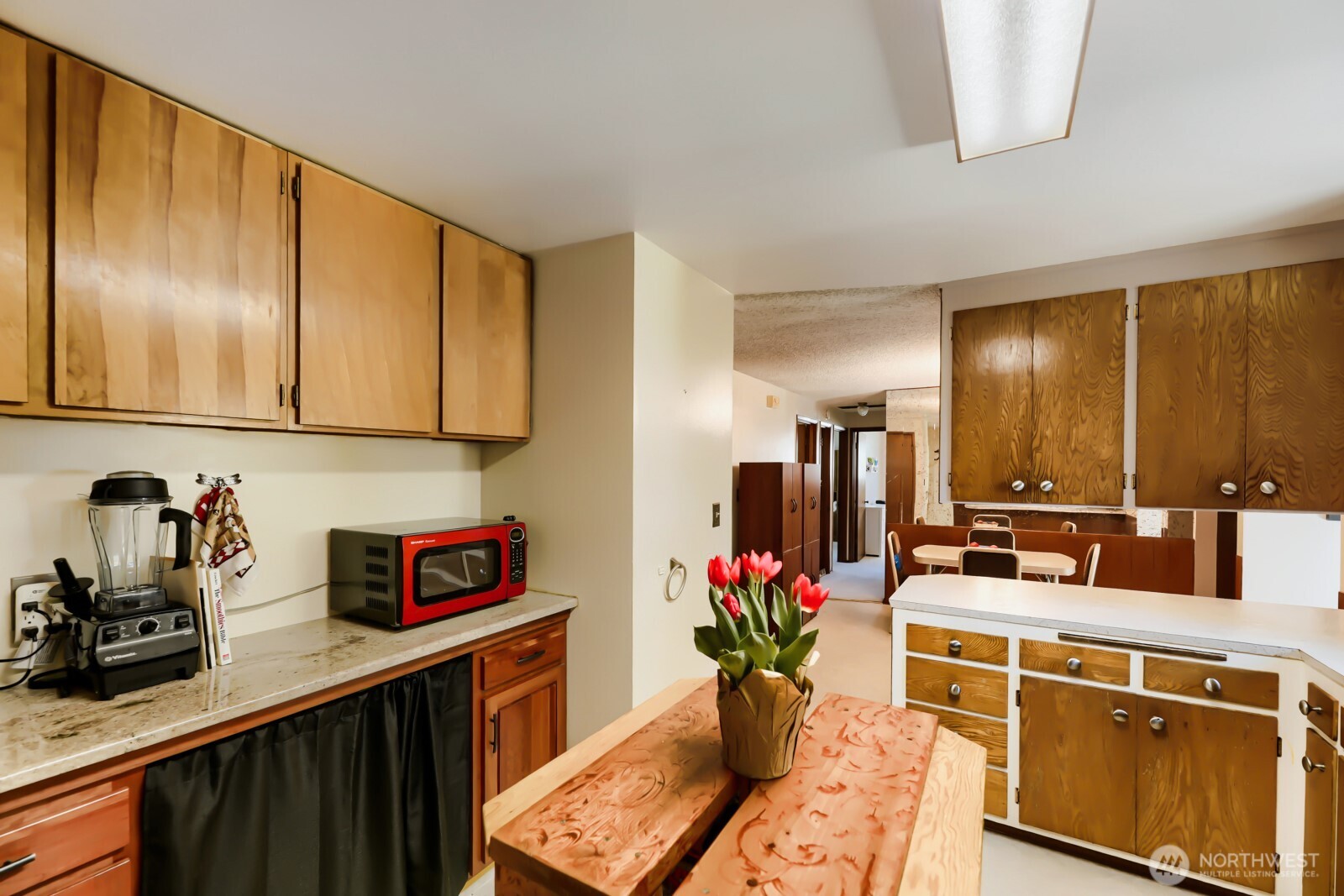 24119 78th Place West Edmonds, WA 98026 - Photo 9 of 29 a kitchen with stainless steel appliances granite countertop a sink stove and cabinets