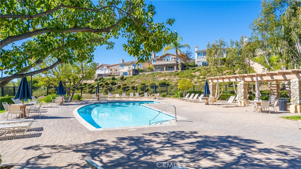 2827 Arbella Lane Thousand Oaks, CA 91362 - Photo 45 of 48 a view of a swimming pool with a patio
