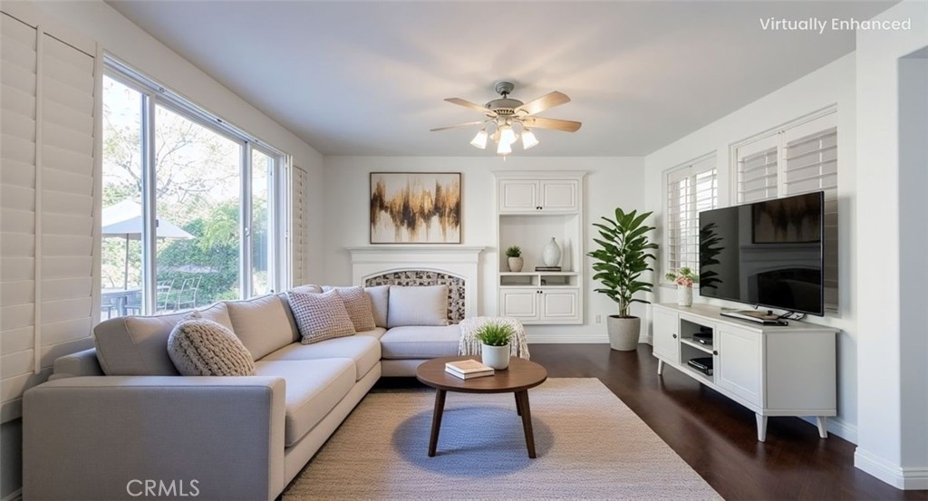 2827 Arbella Lane Thousand Oaks, CA 91362 - Photo 6 of 48 a living room with furniture a flat screen tv and a large window