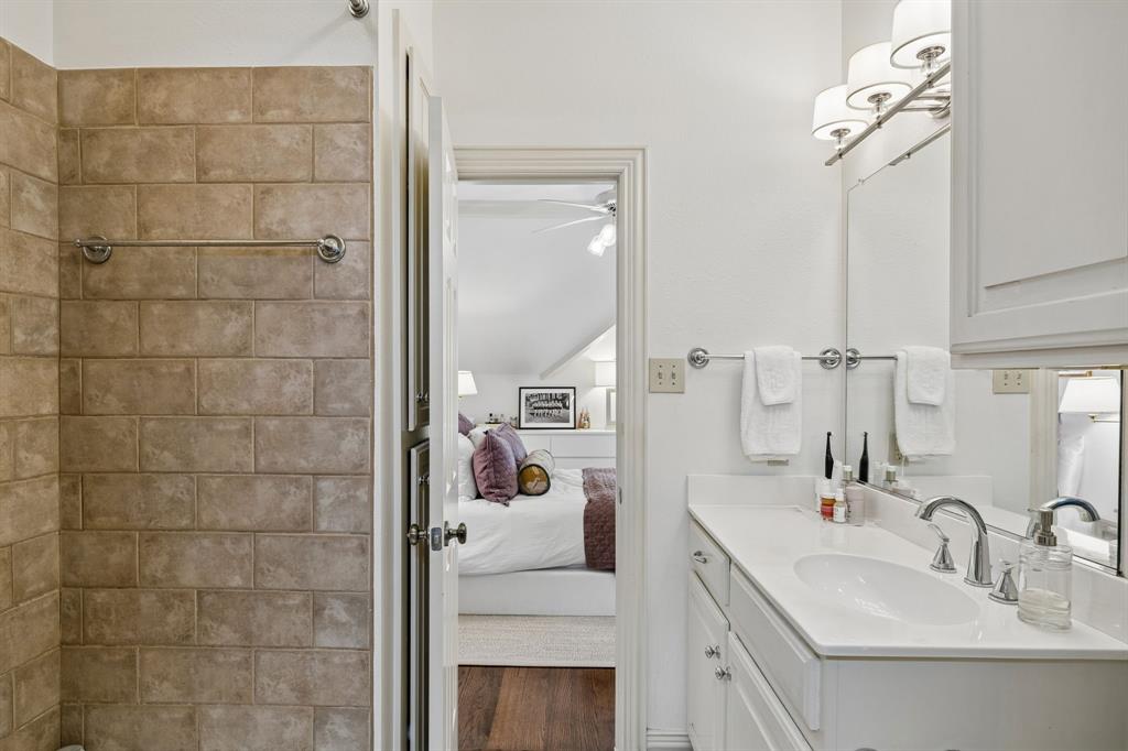 3101 Rosedale Avenue, Unit D University Park, TX 75205 - Photo 11 of 23 a bathroom with a sink vanity and mirror
