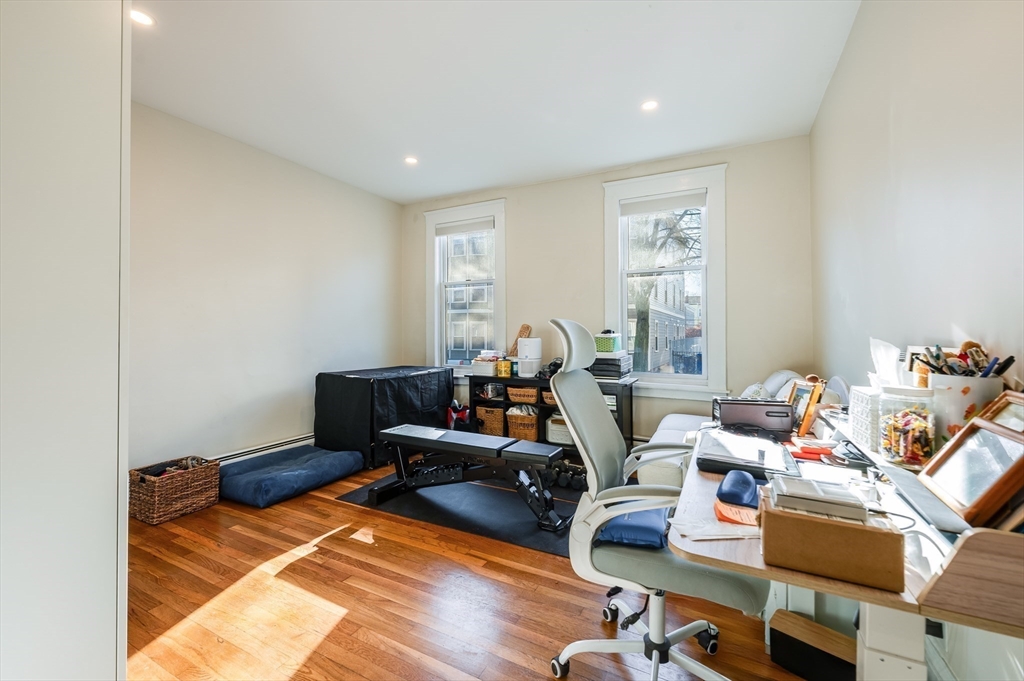 874 East 2nd Street, Unit 1 Boston, MA 02127 - Photo 7 of 10 a living room with furniture