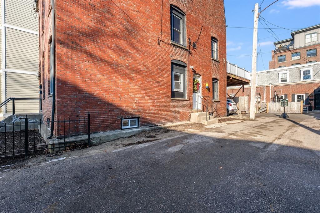 874 East 2nd Street, Unit 1 Boston, MA 02127 - Photo 9 of 10 a view of a building with a street