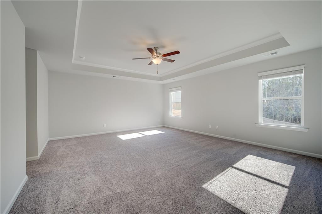 309 Exeter Court Stockbridge, GA 30281 - Photo 25 of 34 a view of an empty room with a window