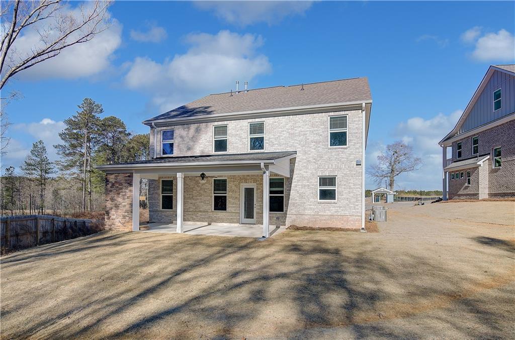 309 Exeter Court Stockbridge, GA 30281 - Photo 33 of 34 a front view of a house with a yard