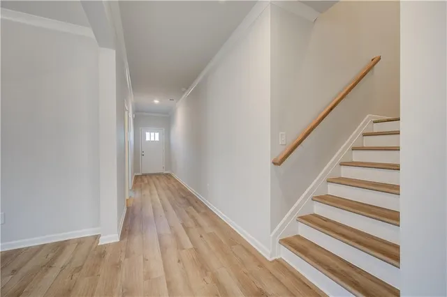 a view of entryway with wooden floor