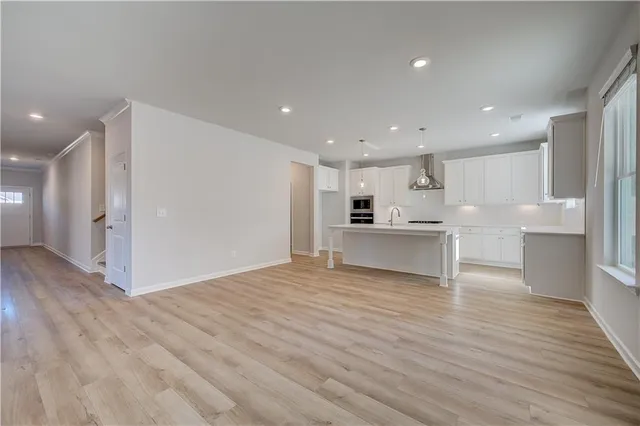 a view of kitchen with wooden floor