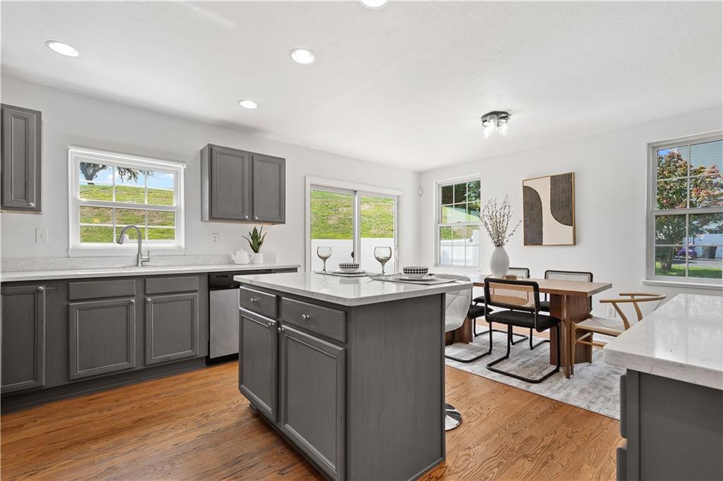 313 Hickory Nut Drive Eighty Four, PA 15330 - Photo 11 of 33 a kitchen with sink cabinets and wooden floor