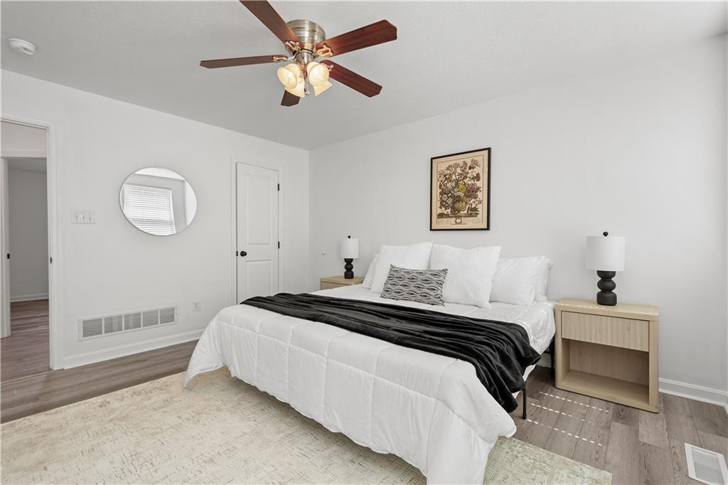 313 Hickory Nut Drive Eighty Four, PA 15330 - Photo 13 of 33 a bedroom with a bed and a chandelier