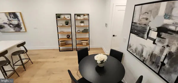 a view of a livingroom with furniture and window