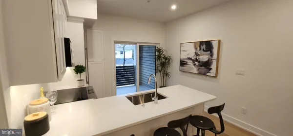 a living room with furniture and window