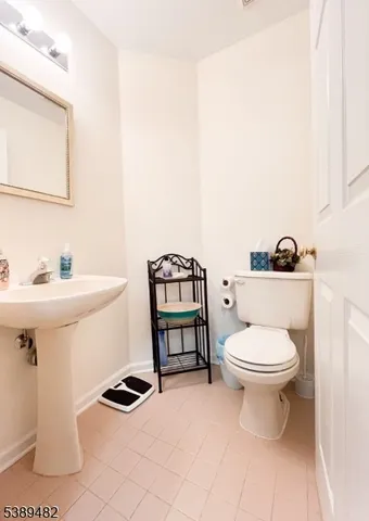 a view of a hallway with staircase