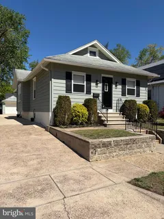 a front view of a house with patio
