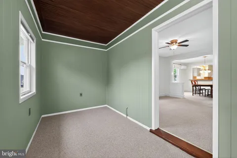 a view of a hallway with workspace