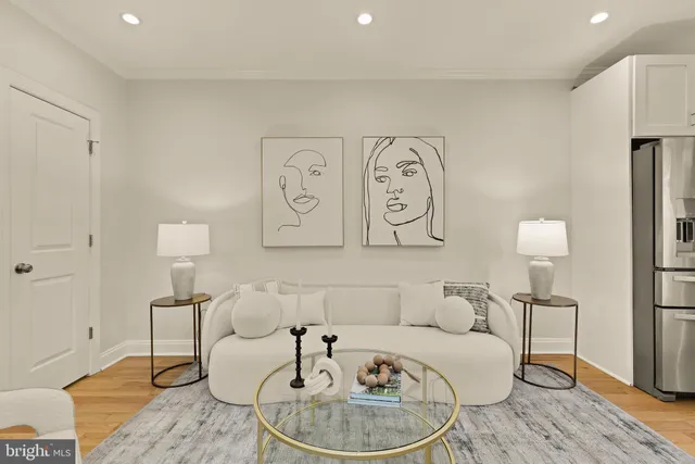 a living room with furniture and a table