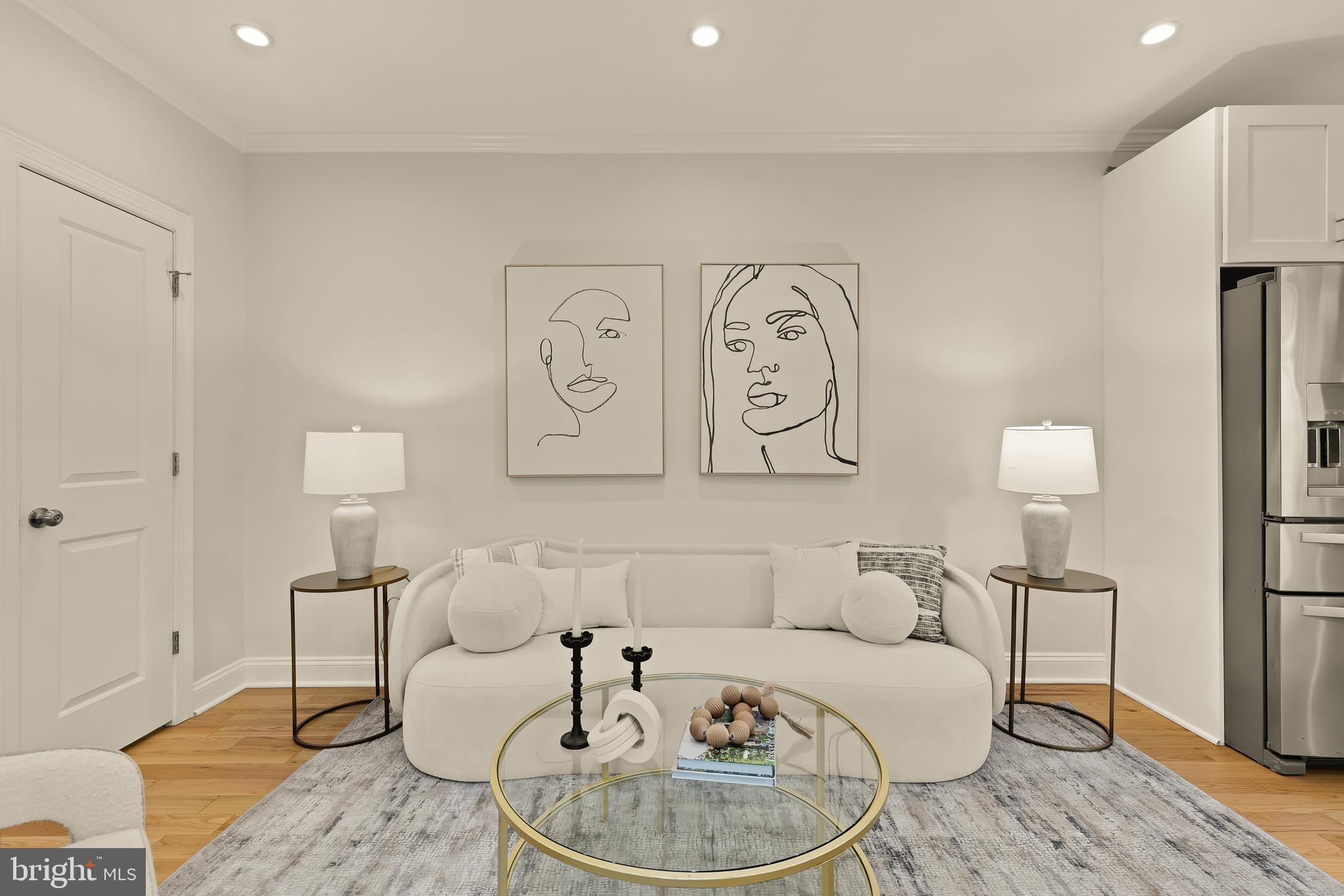 1671 Gales Street Northeast, Unit 1 Washington, DC 20002 - Photo 9 of 30 a living room with furniture and a table