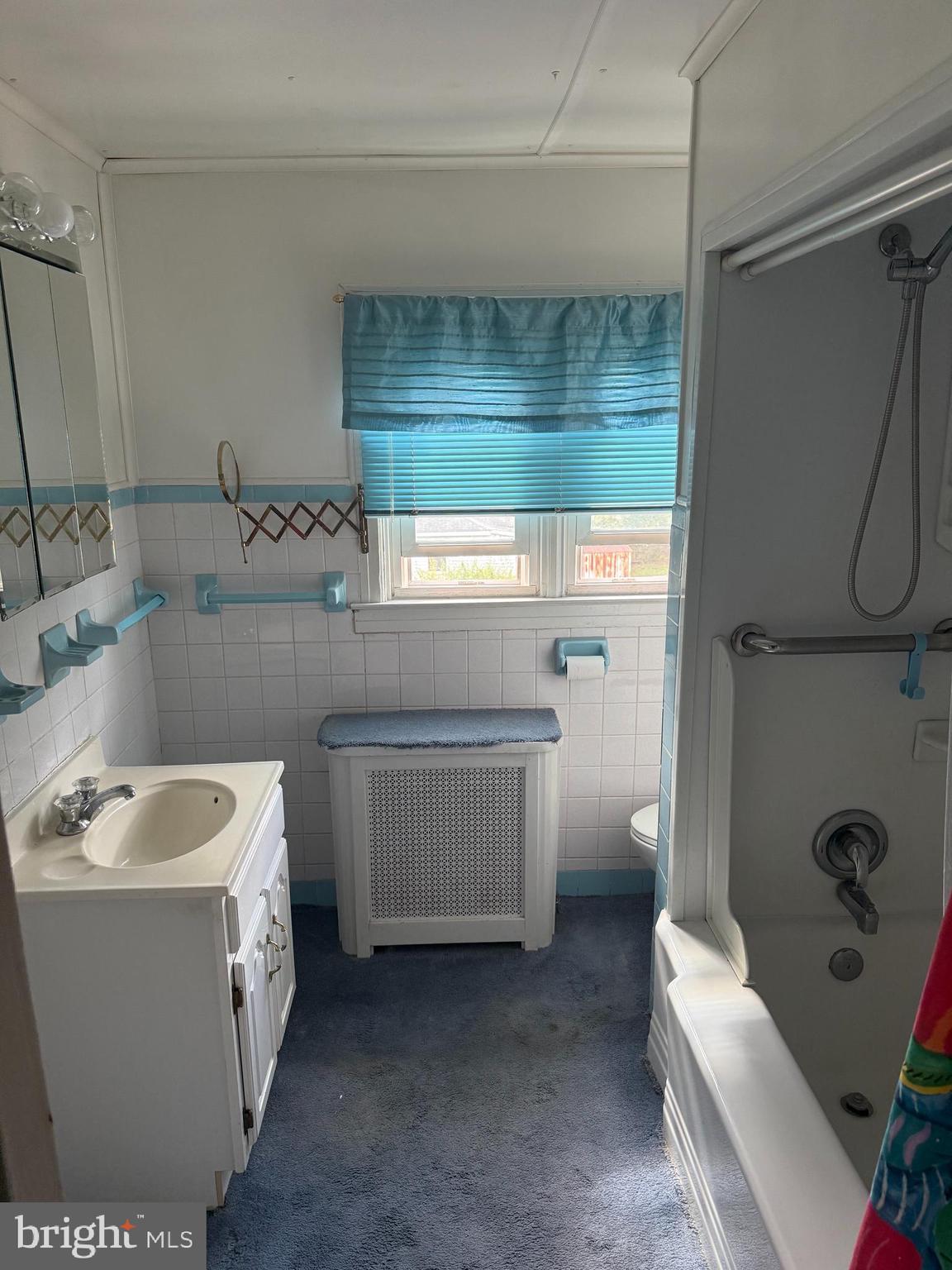 2302 Street Road Warrington, PA 18976 - Photo 13 of 22 a bathroom with a sink a toilet and tub