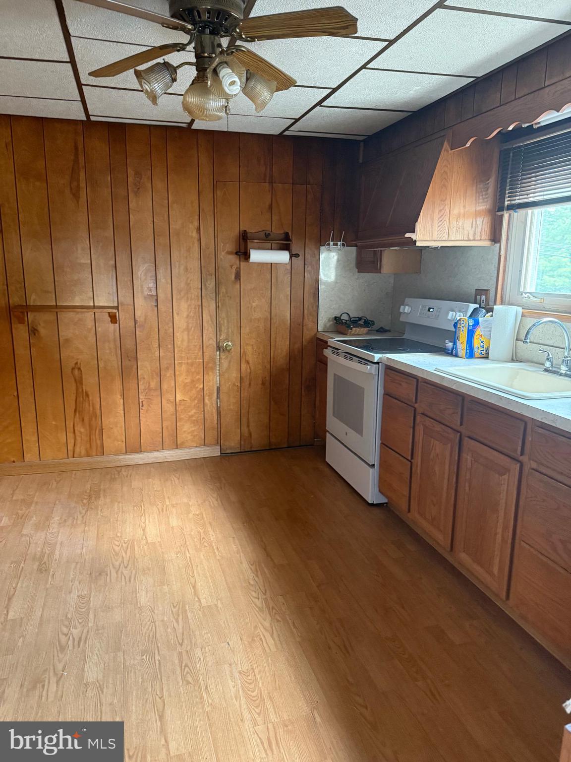 2302 Street Road Warrington, PA 18976 - Photo 6 of 22 a kitchen with stainless steel appliances granite countertop a sink a stove and a refrigerator