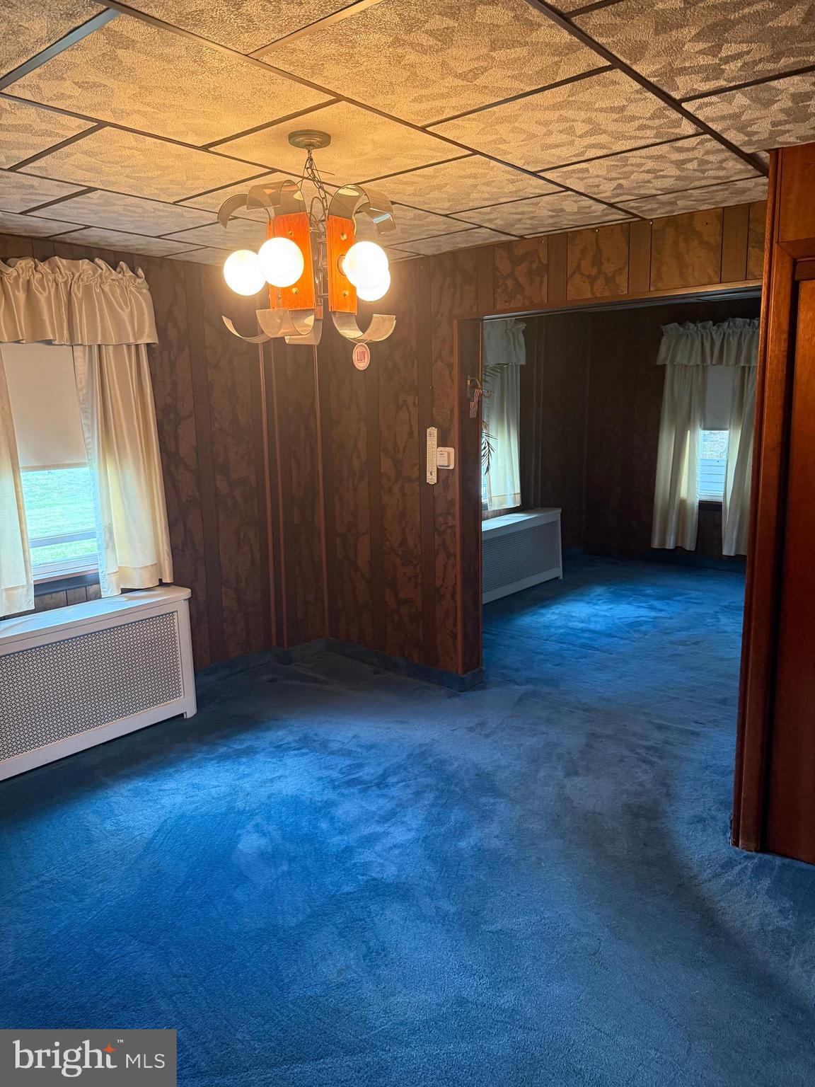 2302 Street Road Warrington, PA 18976 - Photo 9 of 22 an empty room with wooden floor and windows